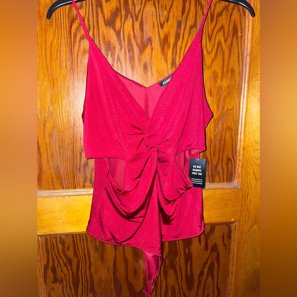 Red twist front, cut out bodysuit. Size Large.